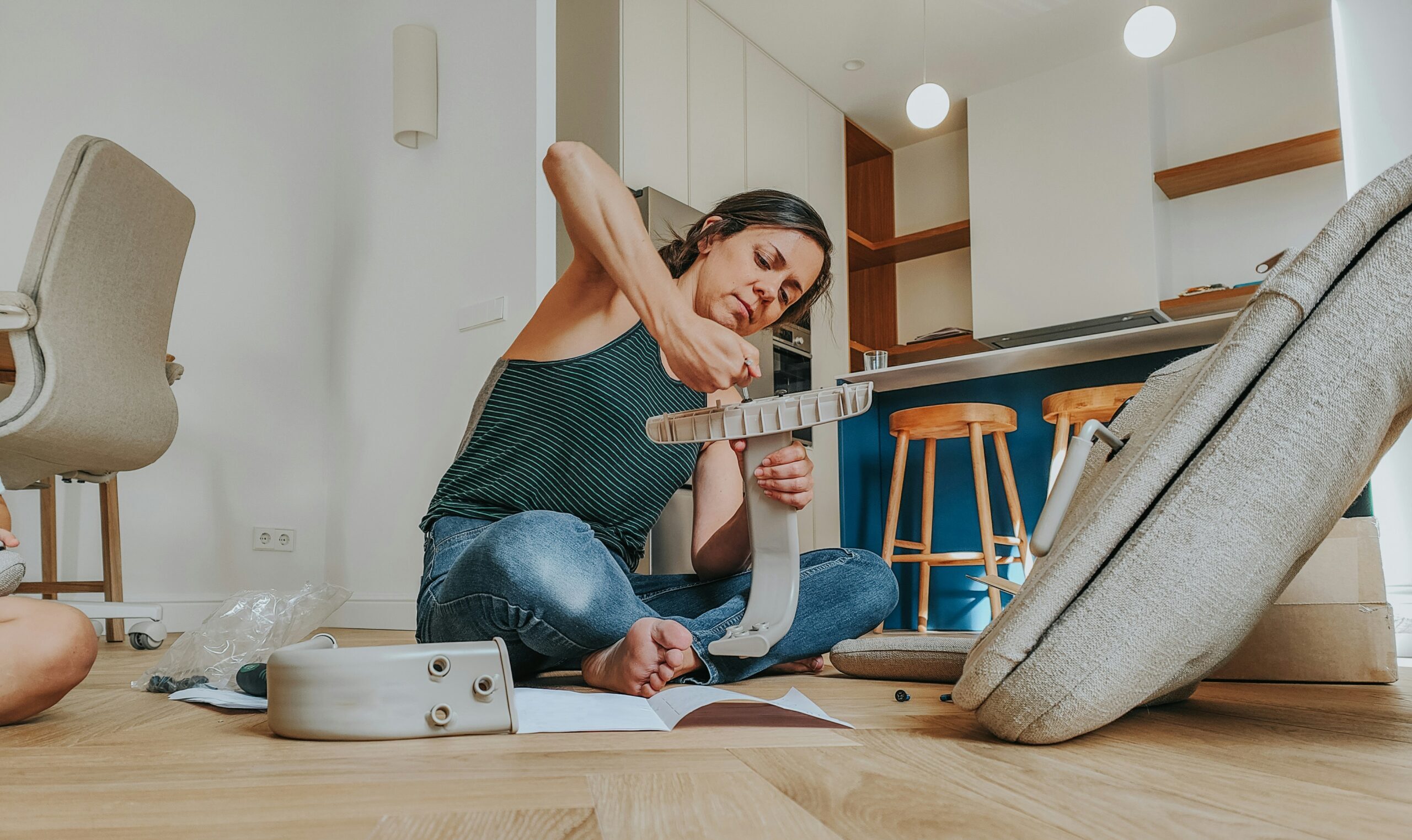 Woman assembling a chair