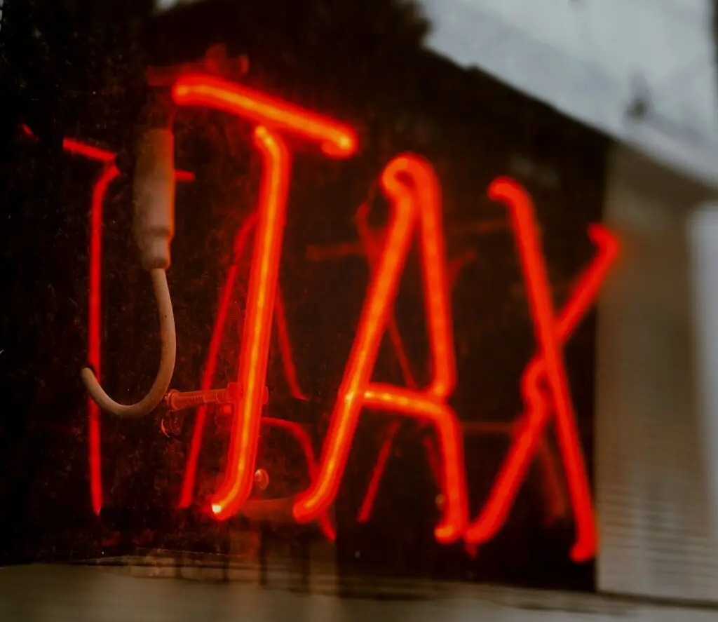 Neon Tax sign